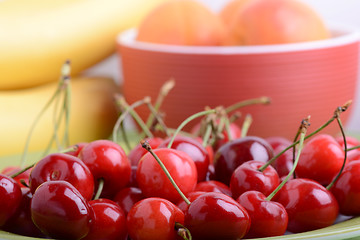 Image showing Composition with fruits cherry bananas apricot