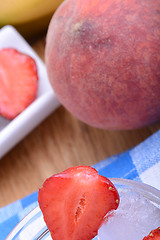 Image showing peach strawberry bananas mandarin close up as health food concept