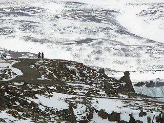 Image showing Tourists at the Icelandic waterfall Godafoss in wintertime