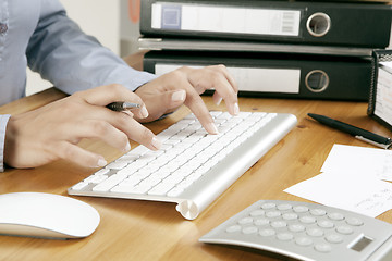 Image showing Secretary with keyboard