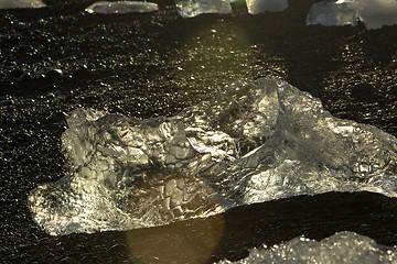 Image showing Ice blocks at glacier lagoon Jokulsarlon, Iceland in evening lig