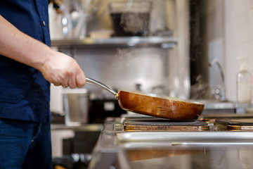 Image showing Chef in restaurant kitchen