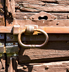 Image showing crugnola abstract in a  door curch  closed wood italy  lombardy 