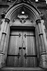 Image showing wooden parliament in london old church door and marble antique  