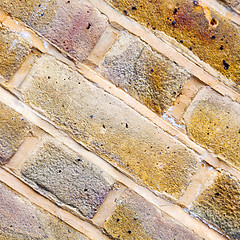 Image showing in london abstract texture of a ancien wall and ruined brick