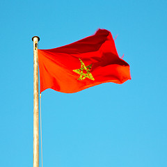 Image showing tunisia  waving flag in the blue sky  colour and battlements  wa