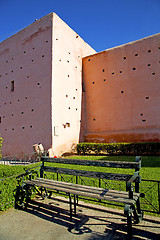 Image showing brown  old ruin in   bench garden  grass  morocco and sky   