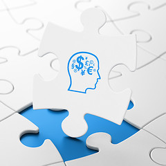 Image showing Finance concept: Head With Finance Symbol on puzzle background