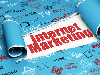 Image showing Marketing concept: red text Internet Marketing under the piece of  torn paper