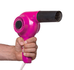 Image showing Old pink hairdryer in hand