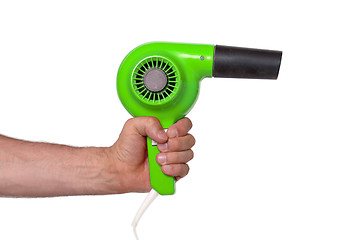 Image showing Old green hairdryer in hand