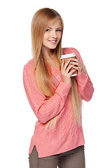 Image showing Woman holding disposable paper cup