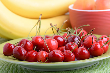 Image showing Composition with fruits cherry bananas apricot