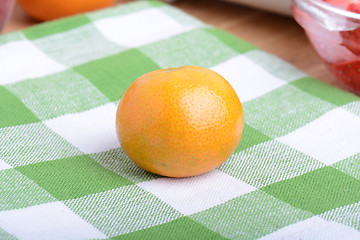 Image showing mandarin and strawberry slices as health food concept