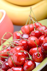 Image showing Composition with fruits cherry bananas apricot