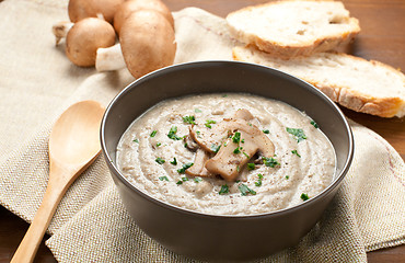 Image showing Cream of porcini mushrooms with cream and parsley