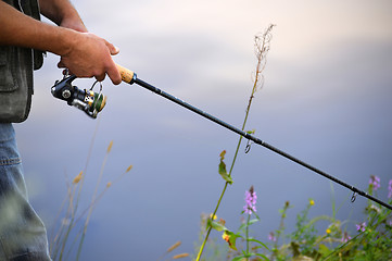 Image showing Spinning in the hands of the fisher