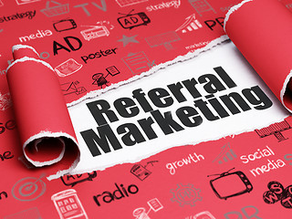 Image showing Advertising concept: black text Referral Marketing under the piece of  torn paper