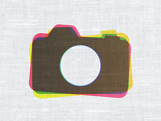 Image showing Tourism concept: Photo Camera on fabric texture background