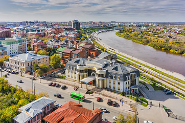 Image showing Office building near quay on Tura river. Tyumen