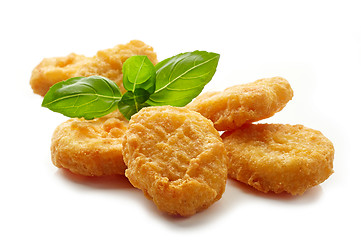 Image showing Chicken nuggets and basil leaf