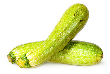 Image showing Two fresh courgette crisscross