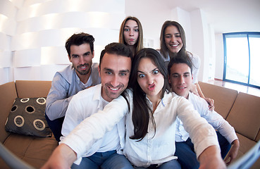 Image showing group of friends taking selfie