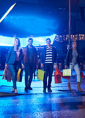 Image showing Group Of Friends Enjoying Shopping