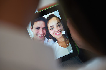 Image showing couple at modern home using tablet computer