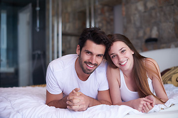 Image showing couple relax and have fun in bed