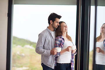 Image showing relaxet young couple drink first morning coffee