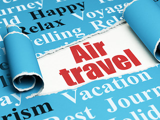 Image showing Travel concept: red text Air Travel under the piece of  torn paper