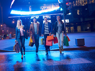 Image showing Group Of Friends Enjoying Shopping