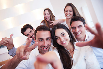 Image showing group of friends taking selfie