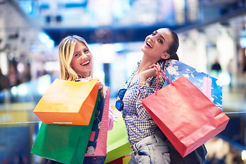 Image showing happy young girls in  shopping mall