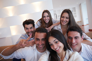 Image showing group of friends taking selfie