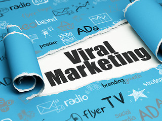 Image showing Marketing concept: black text Viral Marketing under the piece of  torn paper