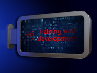 Image showing Education concept: Training and Development and Head With Lightbulb on billboard background