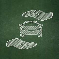 Image showing Insurance concept: Car And Palm on chalkboard background