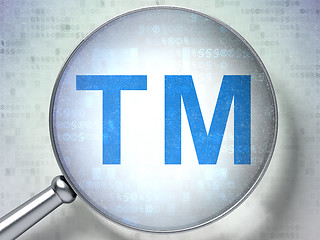 Image showing Law concept: Trademark with optical glass on digital background