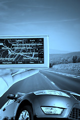 Image showing GPS Vehicle navigation system in a man hand.