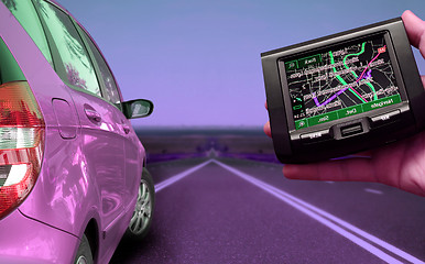 Image showing GPS Vehicle navigation system in a man hand.