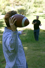 Image showing Throwing football