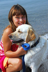 Image showing Girl dog portrait