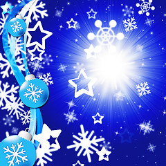 Image showing Blue Snowflakes Background Shows Bright Sun And Snowing\r