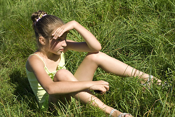 Image showing Relaxing girl on meadow