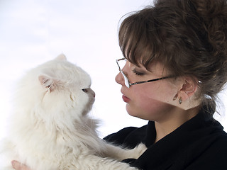 Image showing Young Lady in glasses holding cat