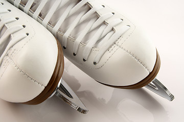 Image showing Closeup of white figure skates