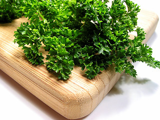 Image showing Fresh parsley on cutting board 1