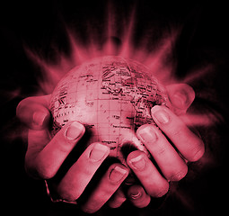 Image showing Globe in a girl's hands